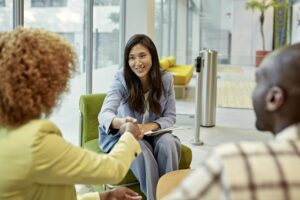 landlord having a conversation with 2 tenants