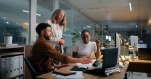 three landlords estimating operating expenses on a computer