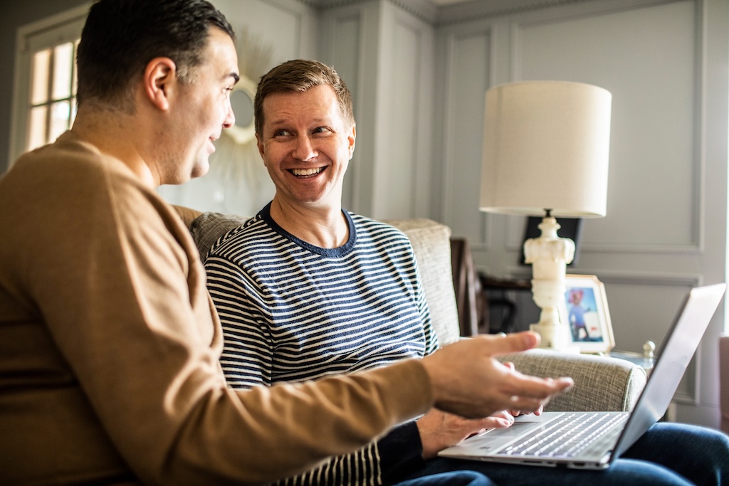 two landlords discussing property management software options